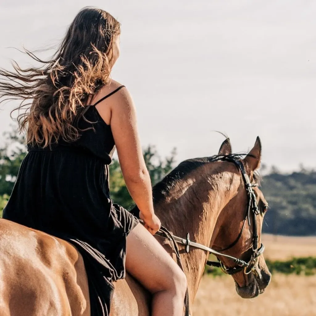 Horseback riding teens sometimes want horses in their senior photos. 